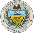 Seal of Lebanon County, Pennsylvania, featuring an eagle, ship, and agricultural elements, surrounded by a decorative border.